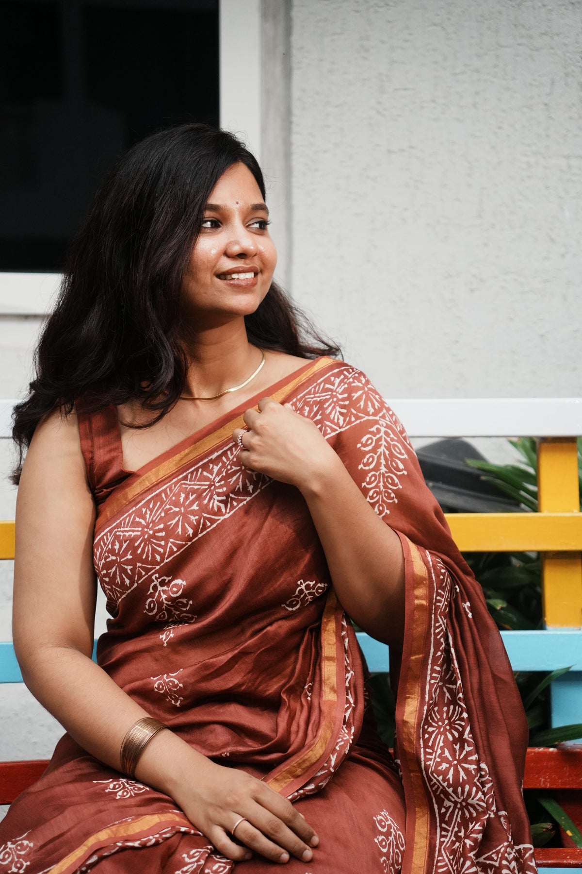 Close view of Mehr rust brown Chanderi silk cotton saree with ivory handblocked motifs