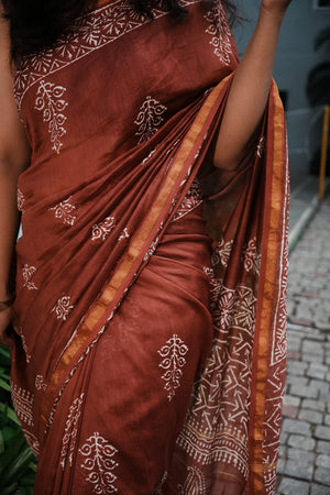 Mehr rust brown Chanderi silk cotton saree with ivory handblocked motifs, full drape