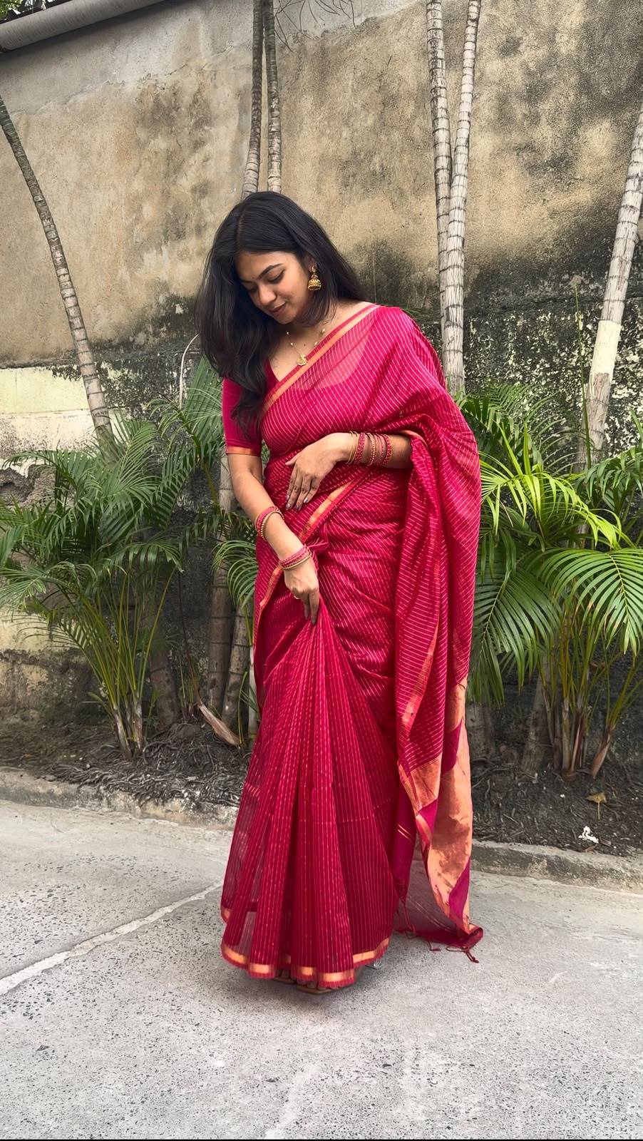 Mrinalini pink-red handwoven Maheswari silk cotton saree, full-length front view