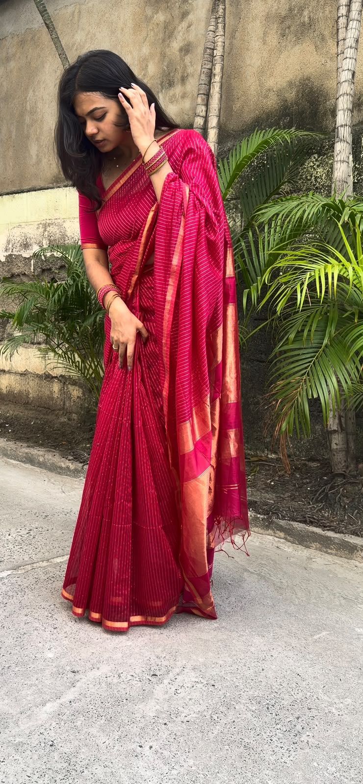 Mrinalini Maheswari silk cotton saree showing gold-toned pallu and drape