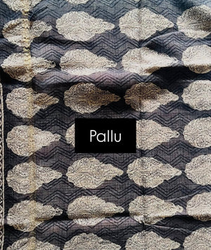 Ruhani Kota Doria saree pallu with ivory floral-filled motifs on black and zigzag detailing